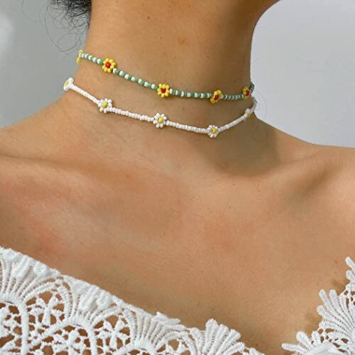 Two beaded flower chokers worn on neck