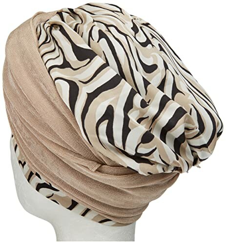 Beige and patterned head wrap on mannequin