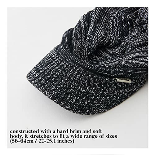 Black knit cap with hard brim and soft body, adjustable size.