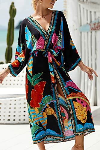 Woman wearing colorful beach cover-up with tropical patterns.