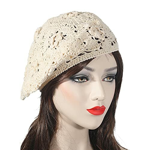 Mannequin wearing a beige crochet beret