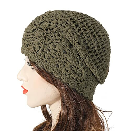 Side view of mannequin wearing green crochet knit beanie