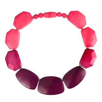 Pink and purple beaded necklace with geometric shapes.