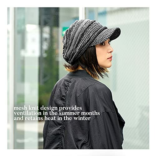 Woman wearing a mesh knit hat in outdoor setting.