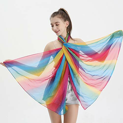 Woman wearing a colorful rainbow scarf as a top.
