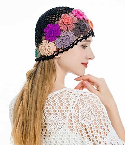 Woman in a crochet hat with colorful flowers