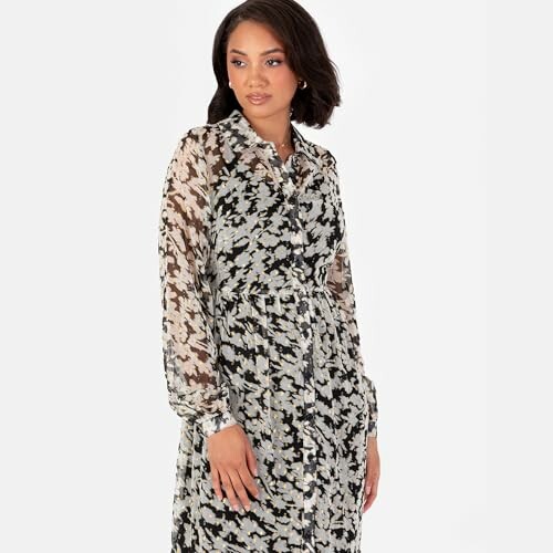 Woman wearing a patterned long-sleeve dress.