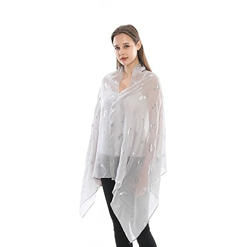Woman wearing a light, sheer scarf with a subtle pattern.