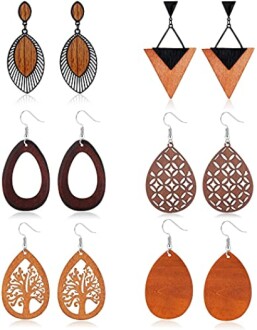 Set of six pairs of wooden earrings with various designs.